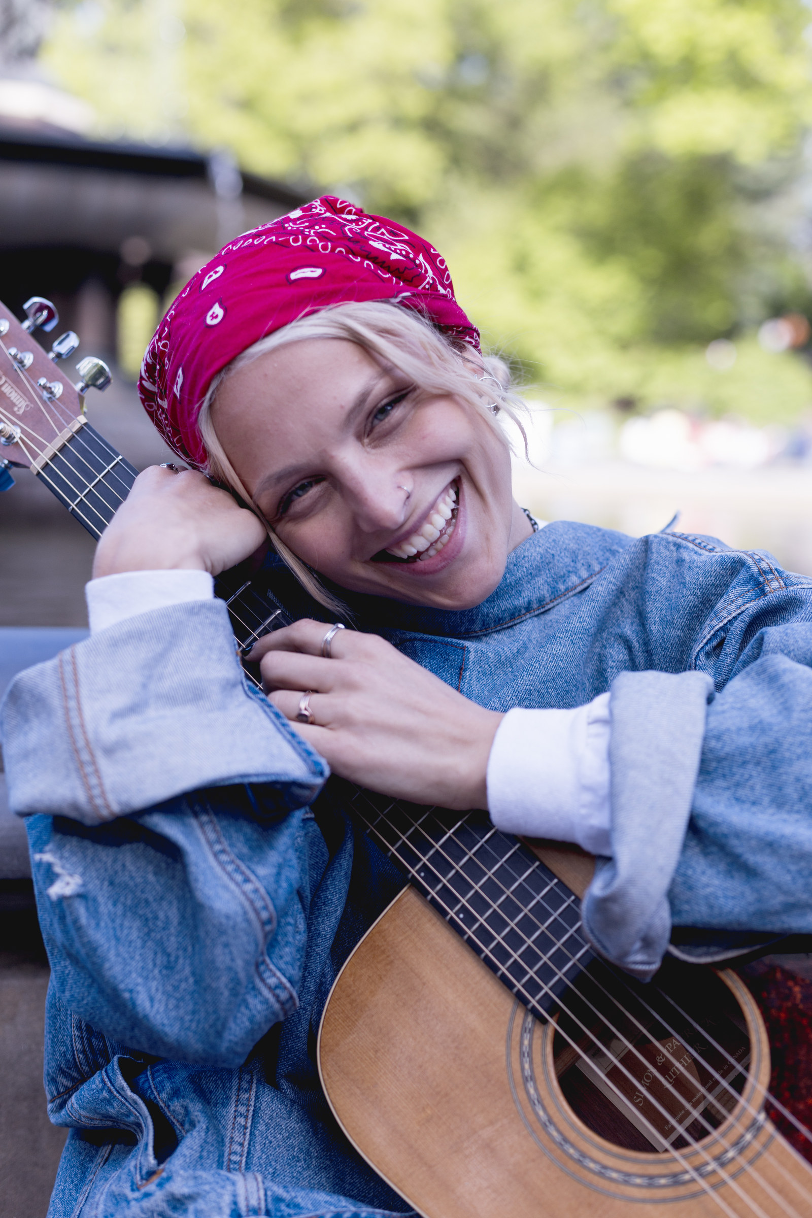 Emily Brimlow with her guitar