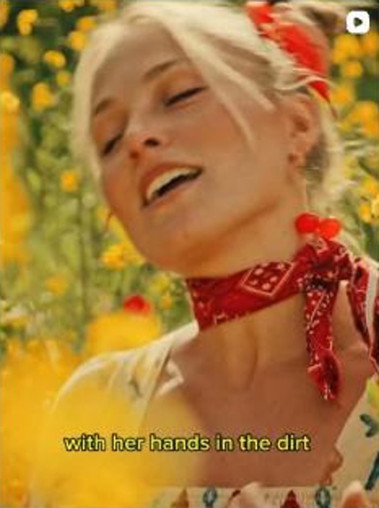 Emily Brimlow in a field of flowers, Flower Child